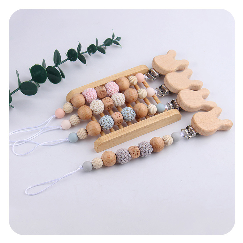 Productos para bebés caricatura conejo abrazadera de haya DIY silicona cuentas para calmar bebés tetina cadena anti-caída cadena