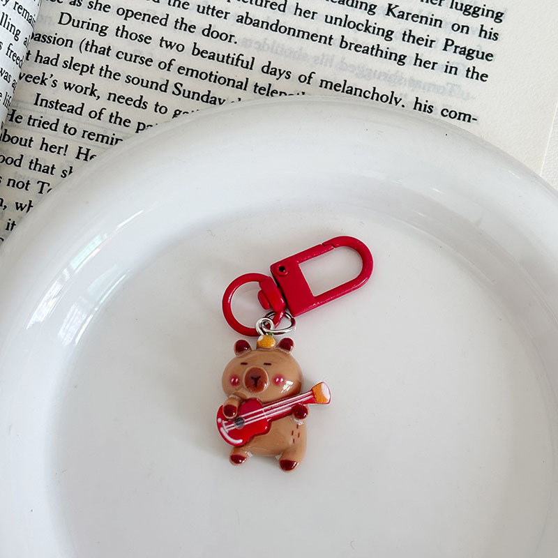 音楽運動の小さい皮の鍵は少女の心の学生を掛けて親友の贈り物のカップルを飾ってペンダントを飾ります。