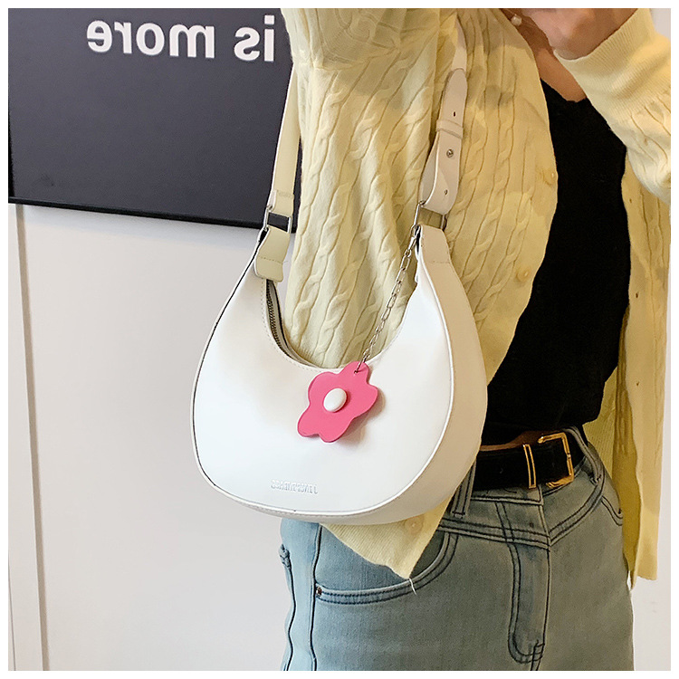 Cross-border women's bag 2024 New style, trendy texture, versatile, ins fashion single-shoulder armpit bag, small flower pendant, crescent moon bag undefined