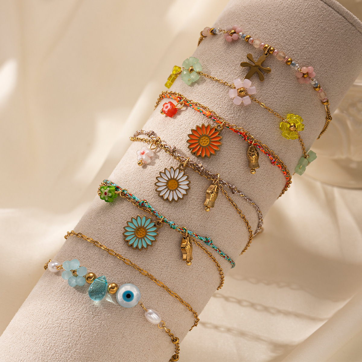 TENA Europa y América pulsera de acero inoxidable lujo ligero nicho flores mariposa colgante pulsera de acero de aluminio joyas de mano calientes transfronterizas