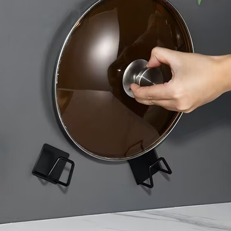 Venta al por mayor de acero inoxidable negro ponche-fregadero libre esponja drenaje rack bola de acero trapo esponja rack de almacenamiento