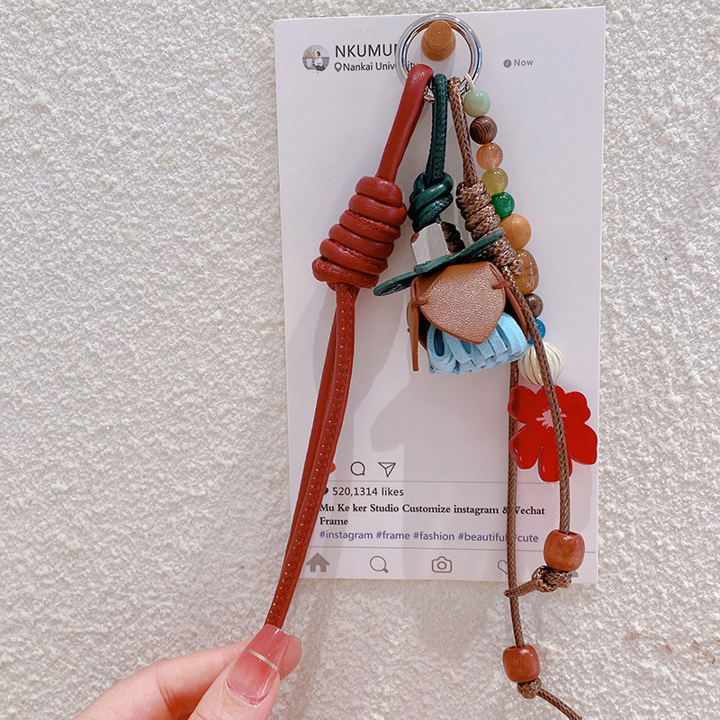 HD9217A04 cadena 05 estrellas otoño y invierno con la misma bola de flores de cuero PU llavero de coche colgante bolso colgante