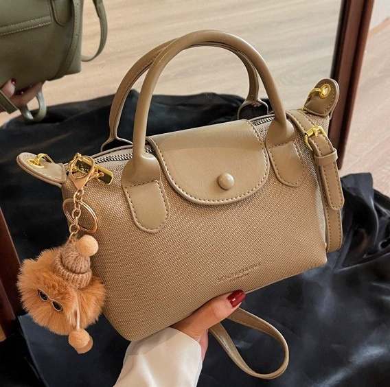 Capacious small design handheld one-shoulder bag