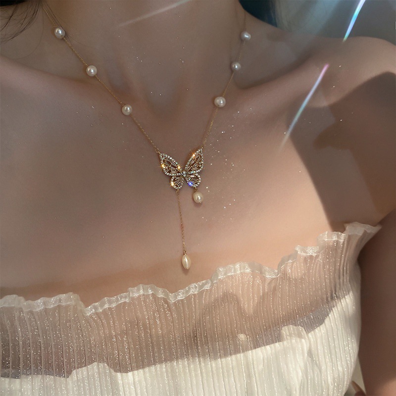 Necklace with butterfly from pearl