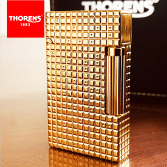 The brand originates from Swiss THORENS Torrens Gas Lighter Creative Brass Carved Grinding Wheel Steel Sound