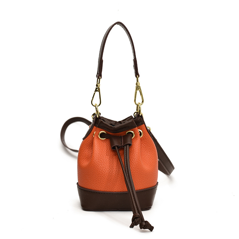 Bolsos de hombro coreanos para niños y niñas de moda estampado de leopardo de color extranjero bolsas de balde de agua para bebés 2025 nuevas bolsas mini para niños