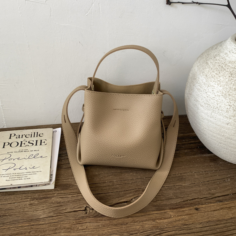 Bolsa de cubo de mano coreana 2026 nuevo nicho diario bolso de cubo bolso de mujer gran capacidad de transporte de viaje mochila