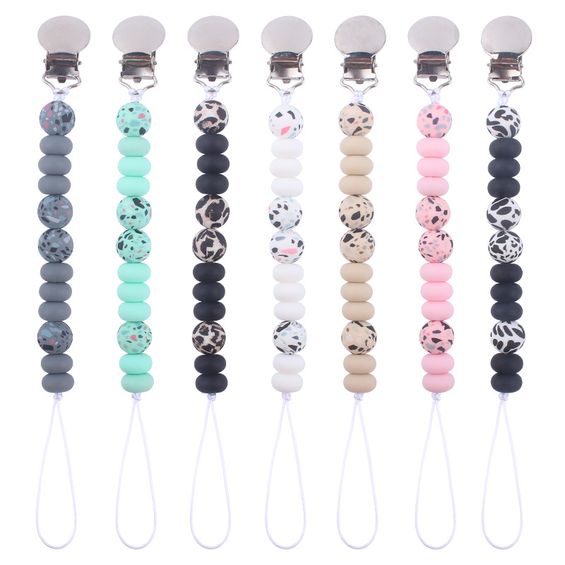 Nuevo bebé suministros de hierro redondo chupete clip creativo bebé calmante leopardo cuentas de silicona mordedor chupete cadena anti-gota cadena