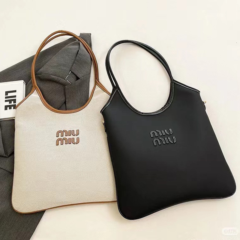 Miu Miao nuevo bolso Tote bolso de compras de gran capacidad Bolso femenino de un solo hombro de lona de moda retro