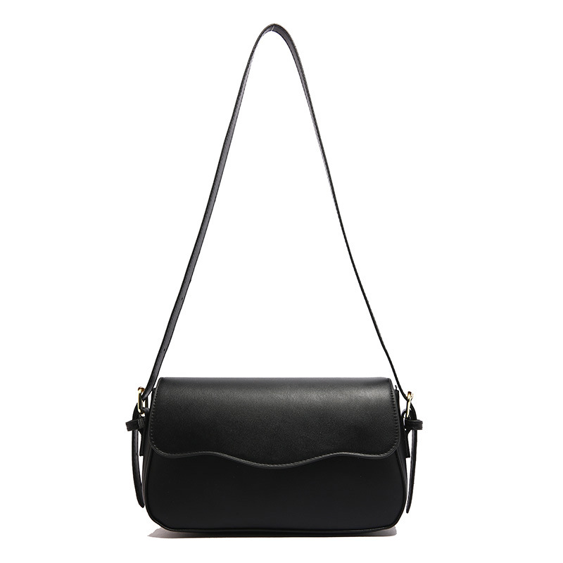 Bolsa de hombro de temperamento para mujeres 2024 otoño nuevo estilo de moda textura mochila de diseño artístico simple bolso de brazo