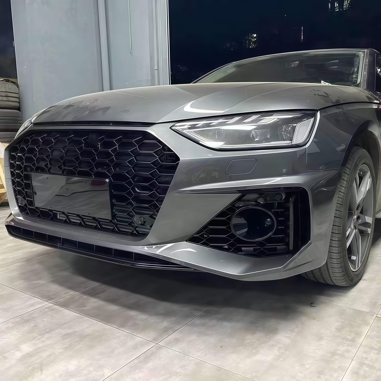 20-22 models suitable for Audi A4L, modified with an RS4-style front bumper, front grille, and front fascia