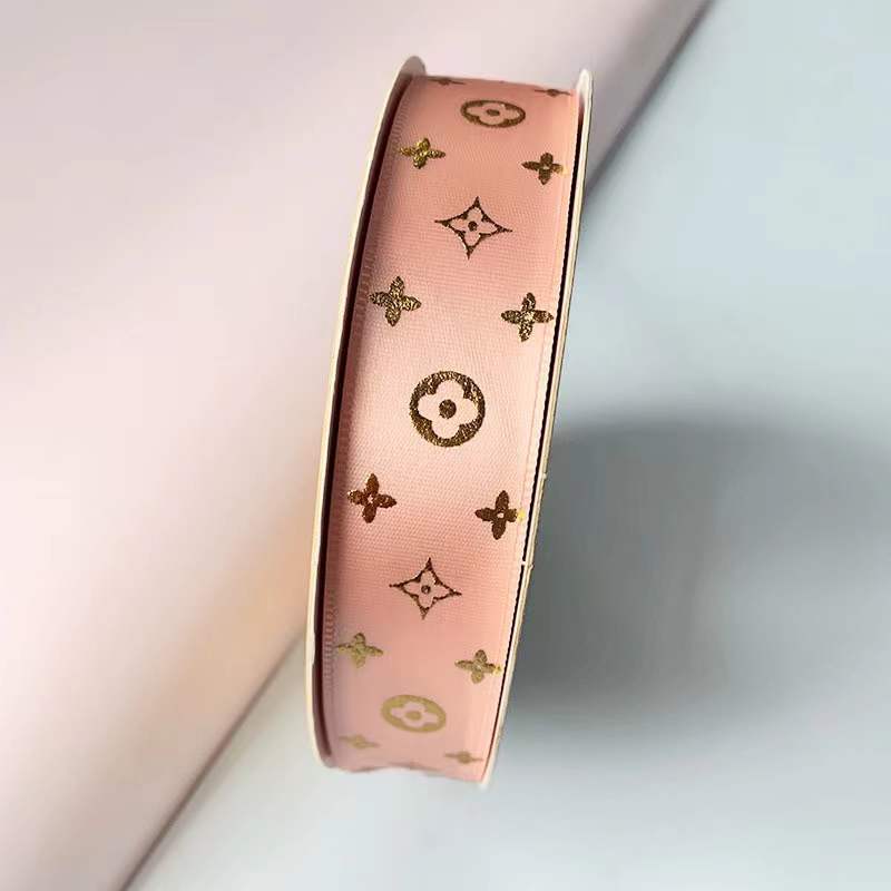 Cinta al por mayor Cinta de Oro L trébol mismo patrón barra bandeja hecha a mano cinta de poliéster flor pastel caja de regalo