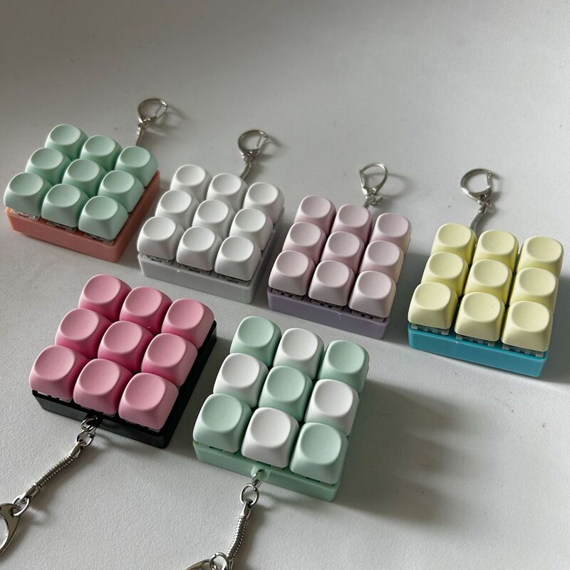 Foreign trade test shaft key decompression toy key chain pendant fingertip press luminous toy fingertip button