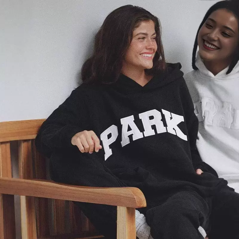 亚马逊外贸独立站2025春季欧美大版连帽卫衣男EXOTIC无绳落肩袖女