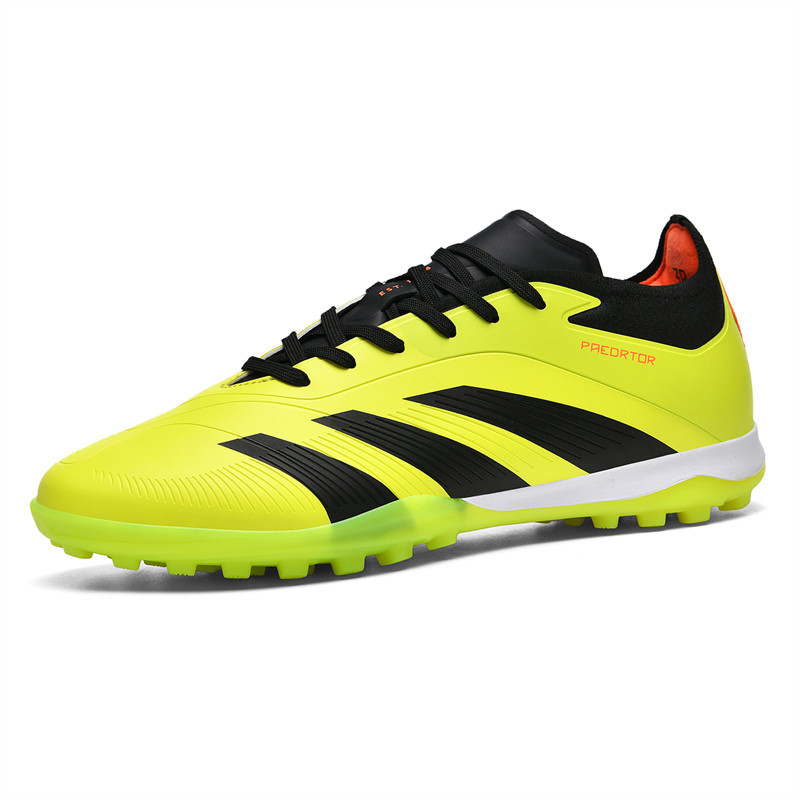 Spot cross-border Putian sin costuras zapatos de fútbol Messi zapatos deportivos de entrenamiento de uñas largas para jóvenes de corte bajo para hombres