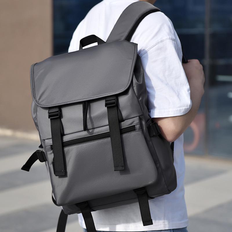 Comercio exterior al por mayor 2024 nueva mochila casual de gran capacidad para hombres, mochila de reducción de carga de viaje al aire libre simple y versátil