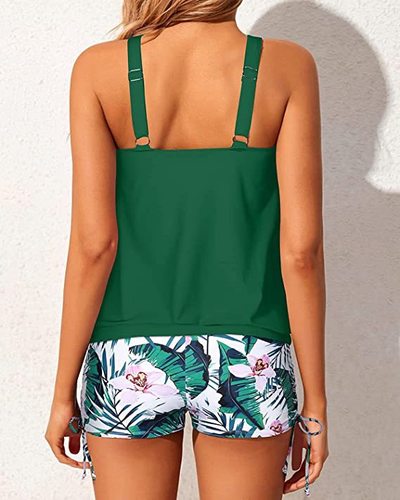 Women's two-piece waist cincher swimsuit set includes a matching top with straight-leg shorts, designed for a relaxed fit.