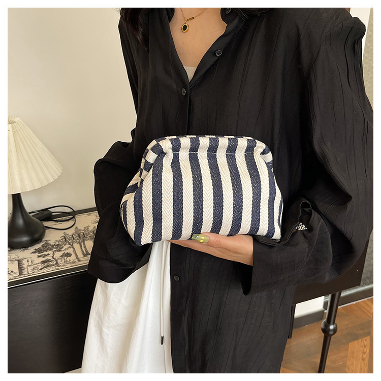New cross-border fashion color-blocking striped cosmetic bag, women's loose change mobile phone storage bag, trendy and niche cloud clutch undefined