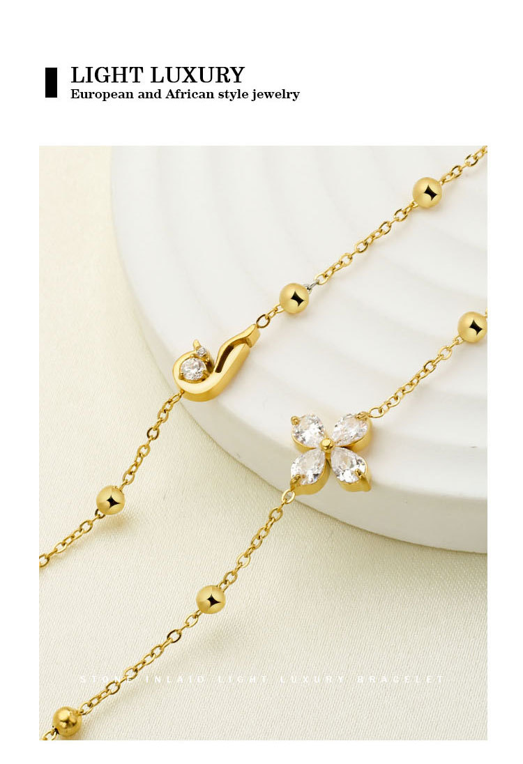 Vacuum Plating Gold Plating Process Lady Flower Titanium Steel Zircon Bracelets In Bulk