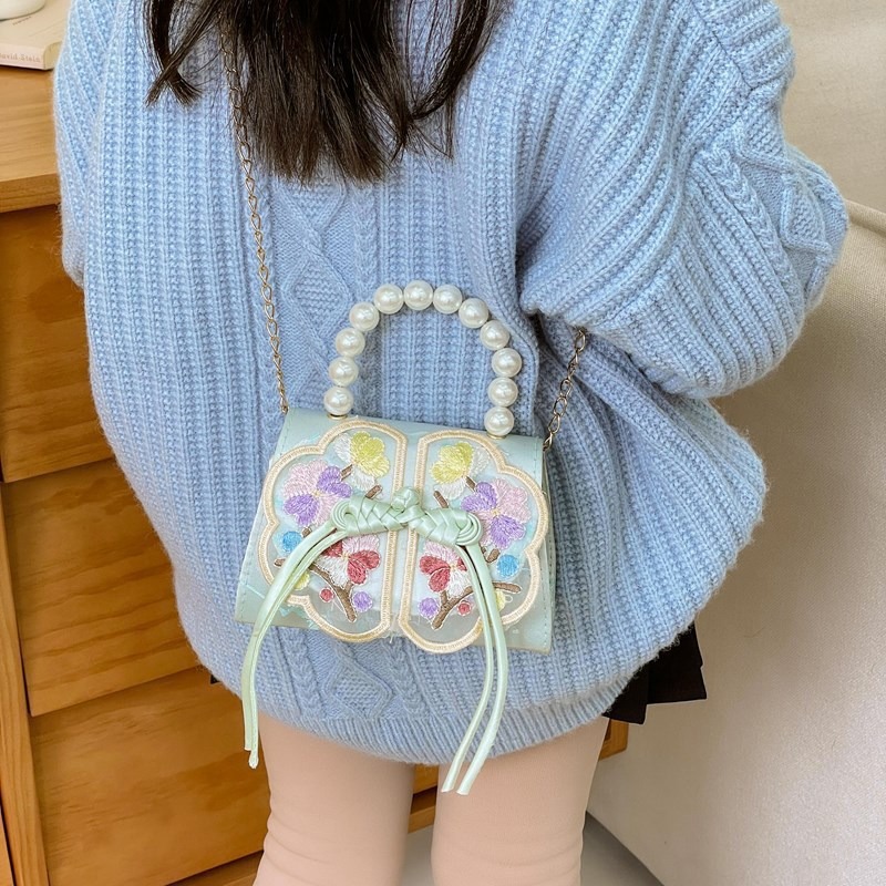 Niñas dulces perlas de aire extranjero bolsas de accesorios portátiles de estilo antiguo con bolsas de ropa de estilo chino niñas lindas bolsas de lápiz labial un hombro