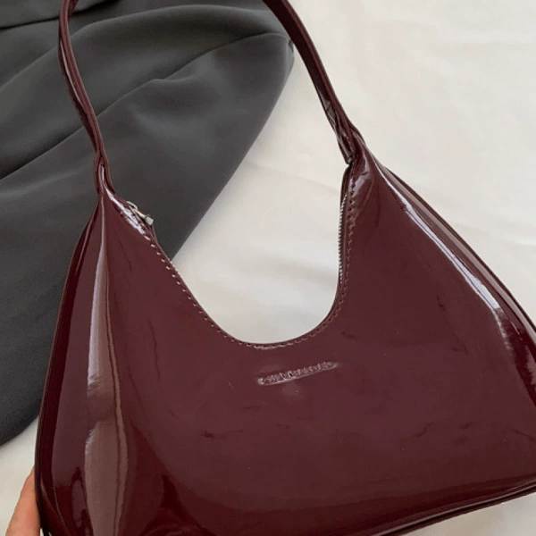 Glossy, burgundy, capacious