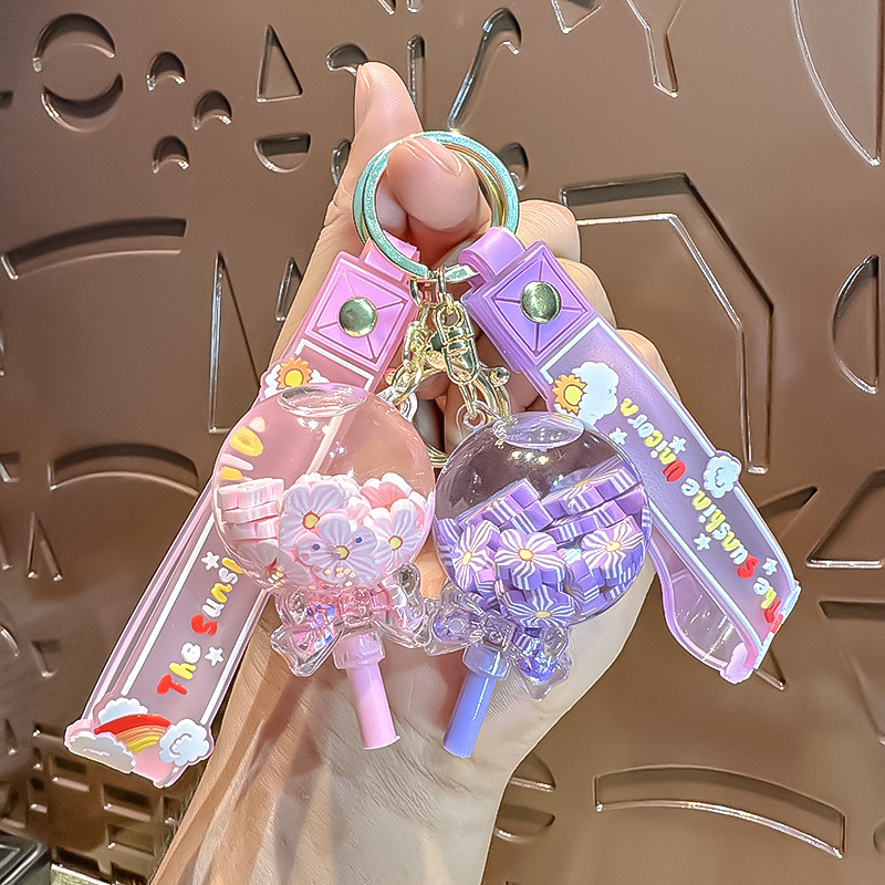 Botella de arena flotante colgante llavero de mujer delicado llavero de flores pequeñas joyas de cristal de niña lindas bolsas colgantes