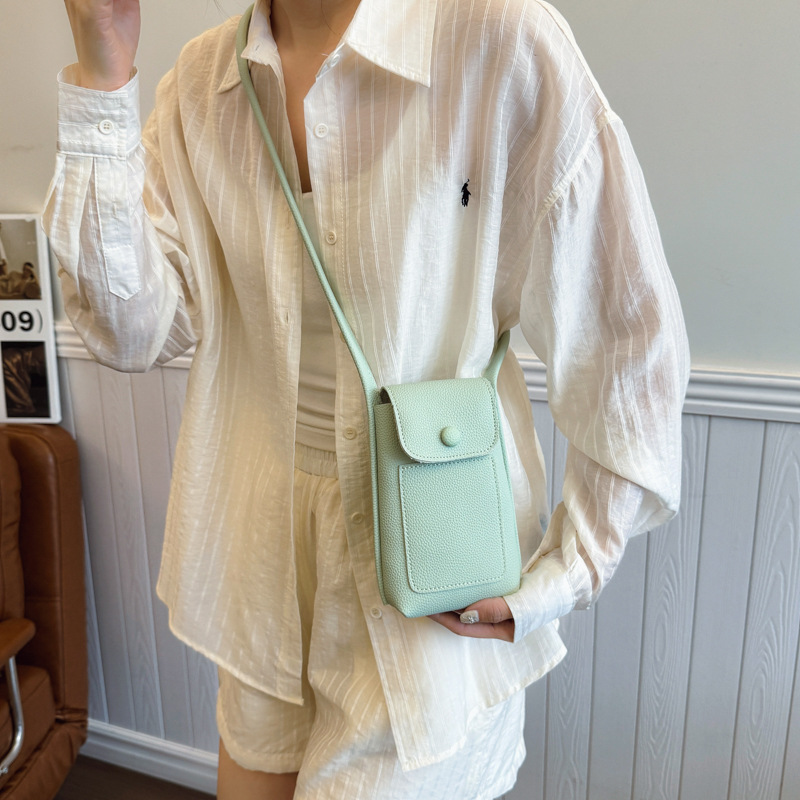Bolso de teléfono móvil de moda coreana 2025 verano nuevo bolso femenino casual con patrón de lichi bolso de hombro simple y versátil bolso de mensajero