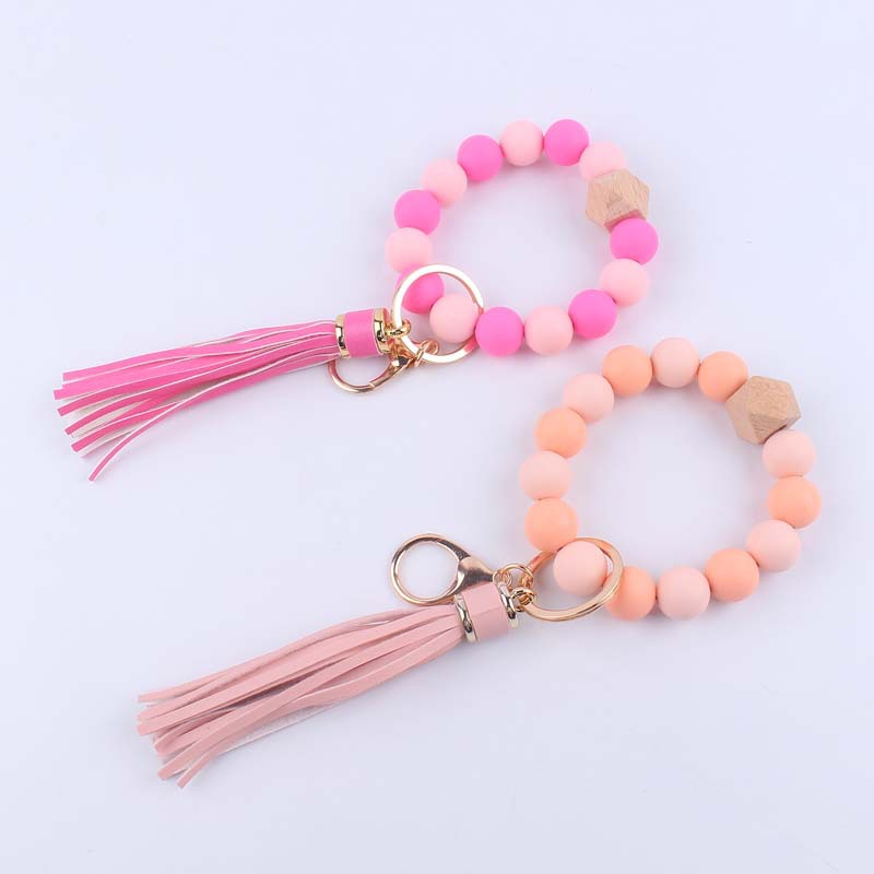 Nueva pulsera de silicona creativa muñeca llavero colgante DIY borla colgante de silicona con cuentas llavero Accesorios