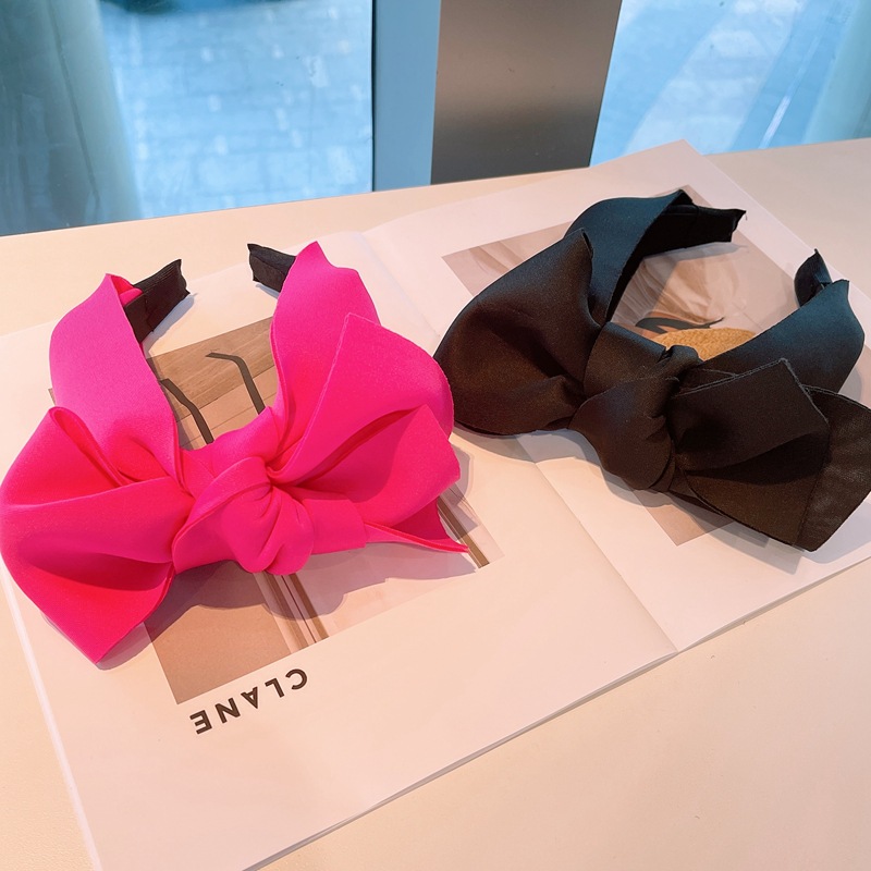 Large, European and American-style inflatable bow-shaped, 3D fashion women's magenta hairband—perfect for side bangs, featuring a sweet and chic, personalized headband accessory.