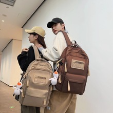 跨境韩版休闲双肩包大容量学生书包初中生学生时尚新款通勤背包男