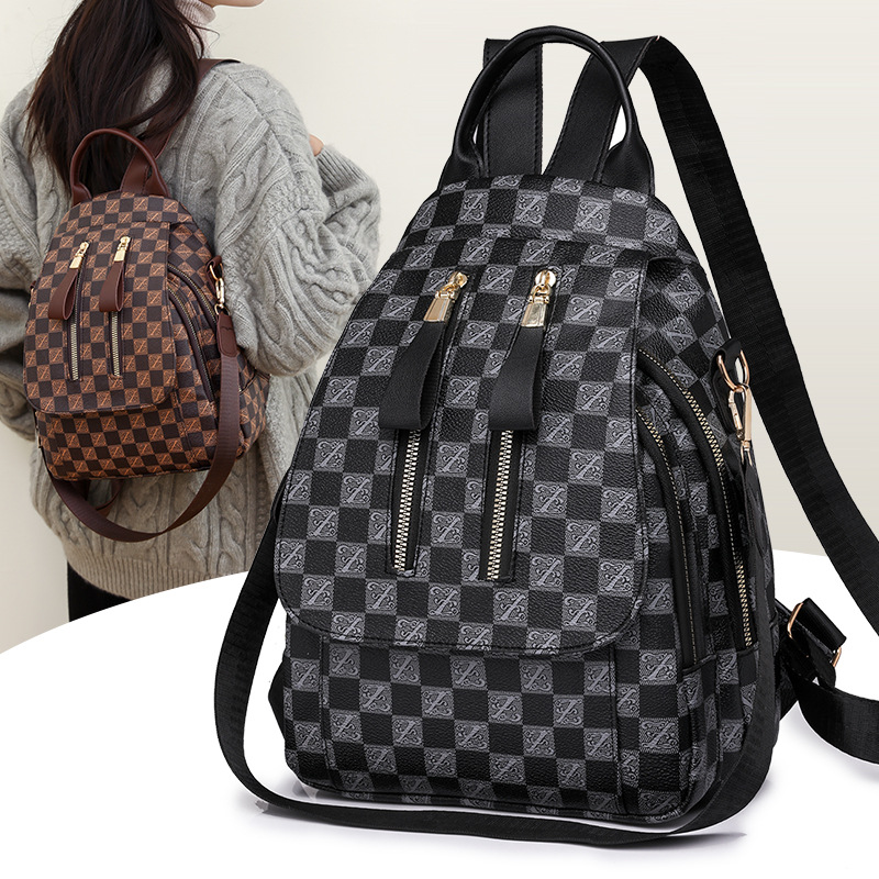 Comercio exterior al por mayor 2023 nueva mochila de cuero suave para mujer a cuadros moda contraste color viajes al aire libre mochila marea