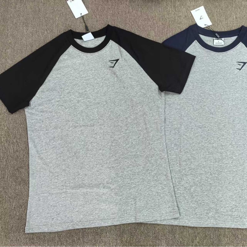 Gymshark raglon修身半袖tシャツ男性は体の弾力性を示しています。|undefined