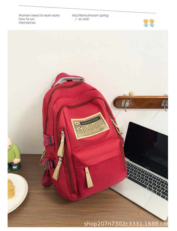学生のリュックサックの韓国版の潮流のアルファベットの中学高校のキャンパスのカバンの多層の大容量のスーツのリュックサックの卸売り|undefined