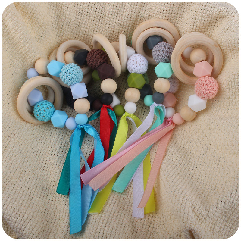 Nuevo bebé suministros cinta pulsera mordedor bebé creativo cuentas de silicona mordida pegamento molar juguete AliExpress