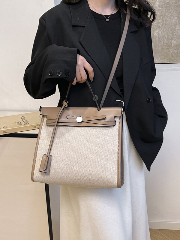Bolso Carey Tote portátil de alta gama 2025 Nuevo estilo transfronterizo Bolso bandolera de gran capacidad de contraste de lona