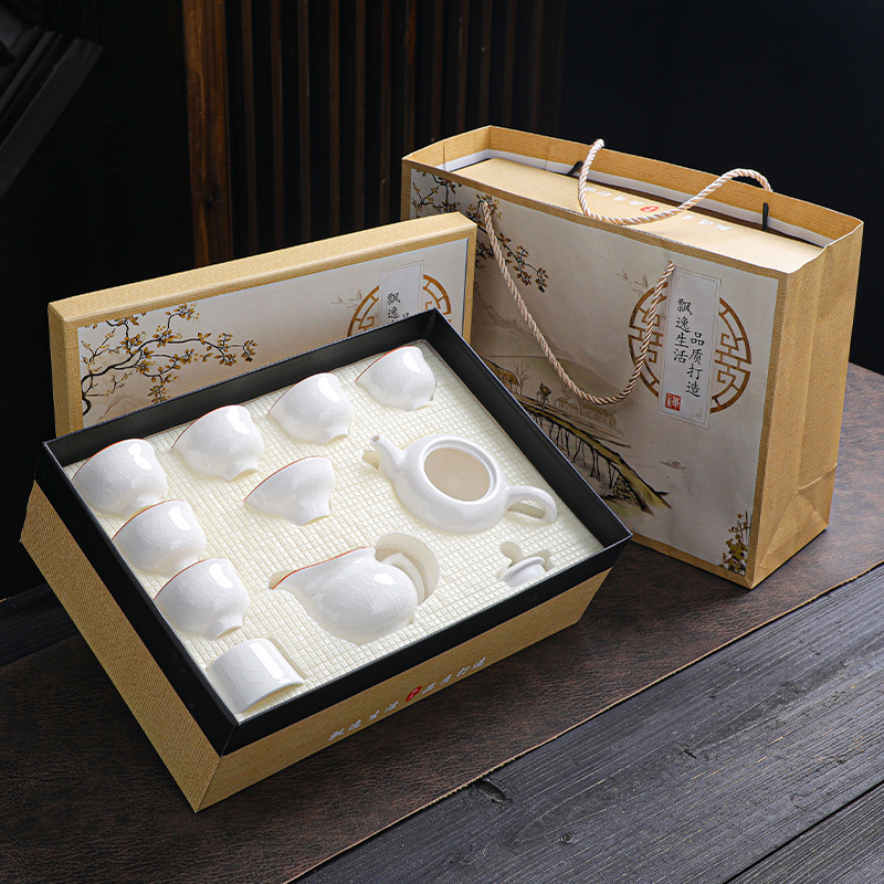 Chinese style Baogao porcelain tea set with openwork kettle and lid, cup, gift box
