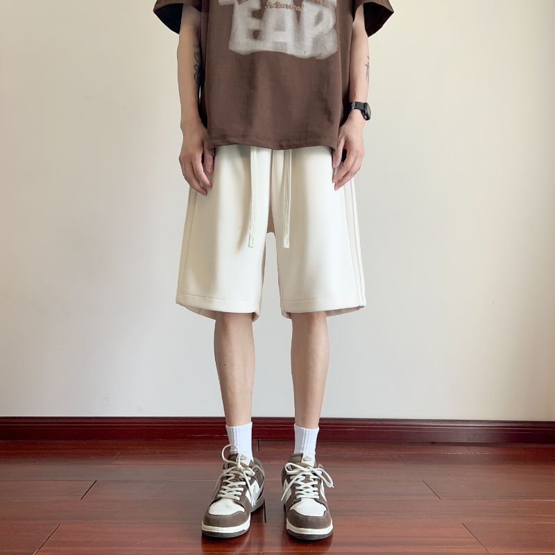 Pantalones cortos para hombres de verano delgados 2024 nuevos pantalones casuales de cinco puntos de moda pantalones deportivos de piernas largas sueltos para hombres