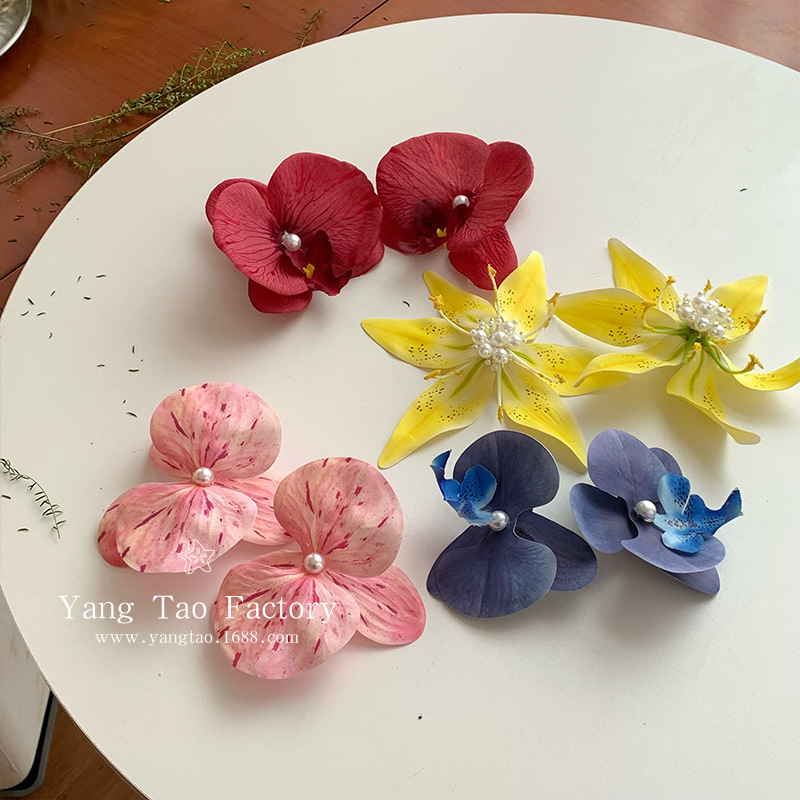 Botones de flores tailandesas de vacaciones en el mar botones de flores atmósfera nicho fotos sandalias accesorios botones de zapatos