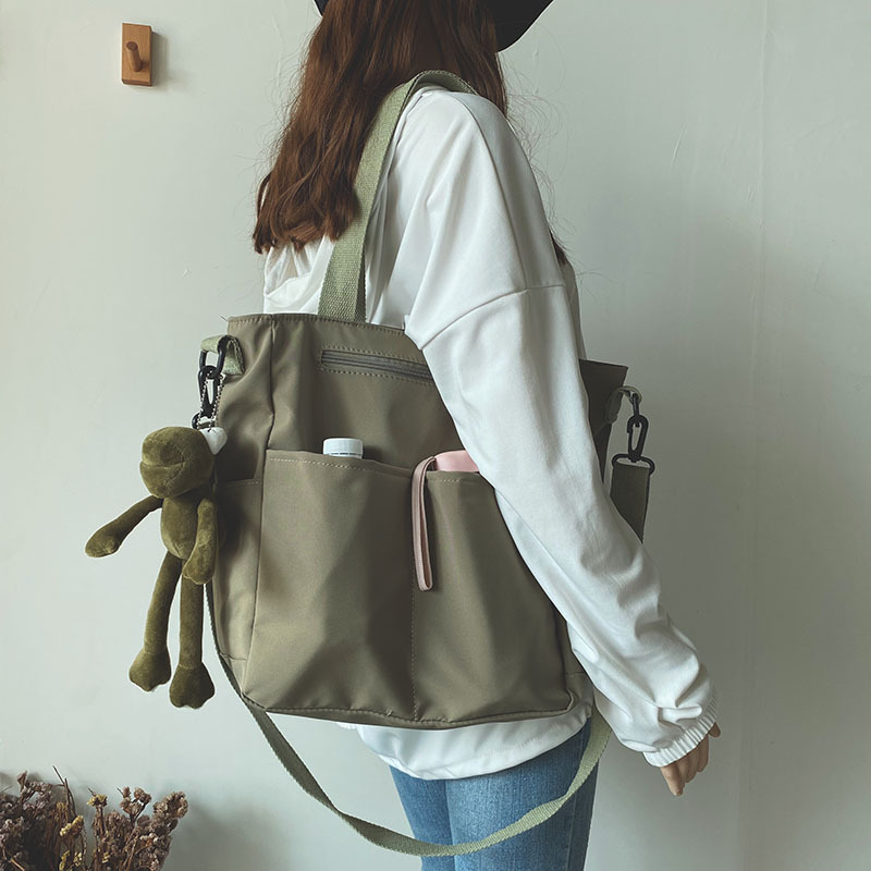 Bolsa de lona impermeable bolsa de hombro de verano para mujer bolsa de gran capacidad para mujer bolsa de mensajero para estudiantes universitarios