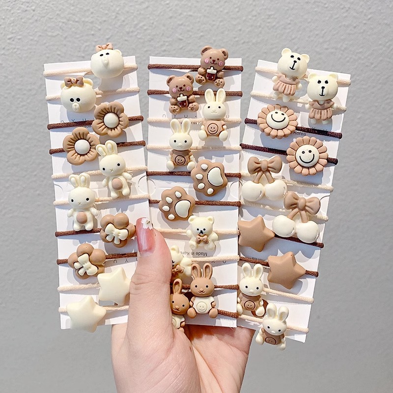 La cuerda del lazo del pelo del bebé la banda del pelo del pulgar de los niños tocado cuerda del pelo del bebé la niña no duele los accesorios del pelo de las muchachas de la banda de goma del pelo