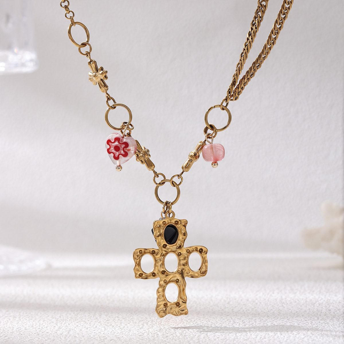 Tiana Europa y América collar de acero inoxidable acero titanio no se desvanece la cruz universal cadena de suéter agujerado joyería de venta caliente transfronteriza
