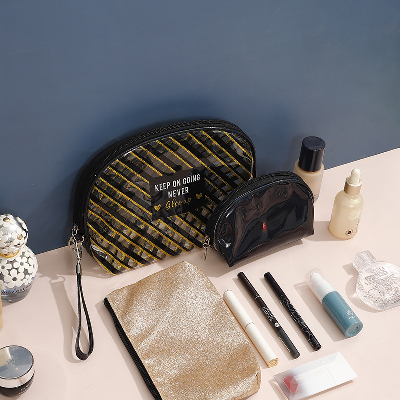 Brand waterproof handheld capacious cosmetic bag for traveling