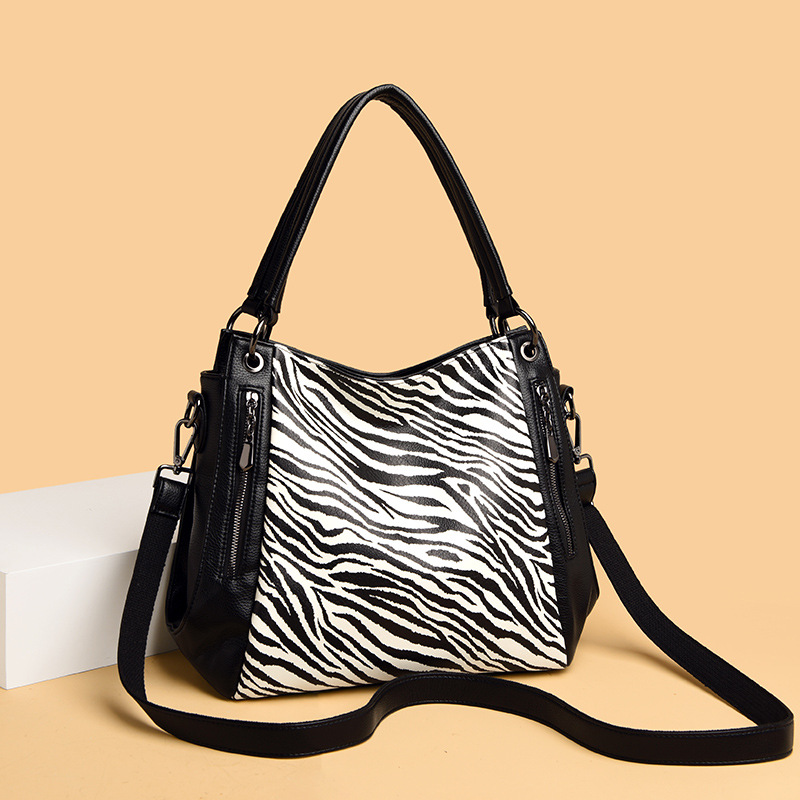 Bolso de mujer de moda transfronteriza 2021 europeo y americano nuevo estampado de leopardo cebra Tote cuero casual bolso suave bolso de hombro portátil