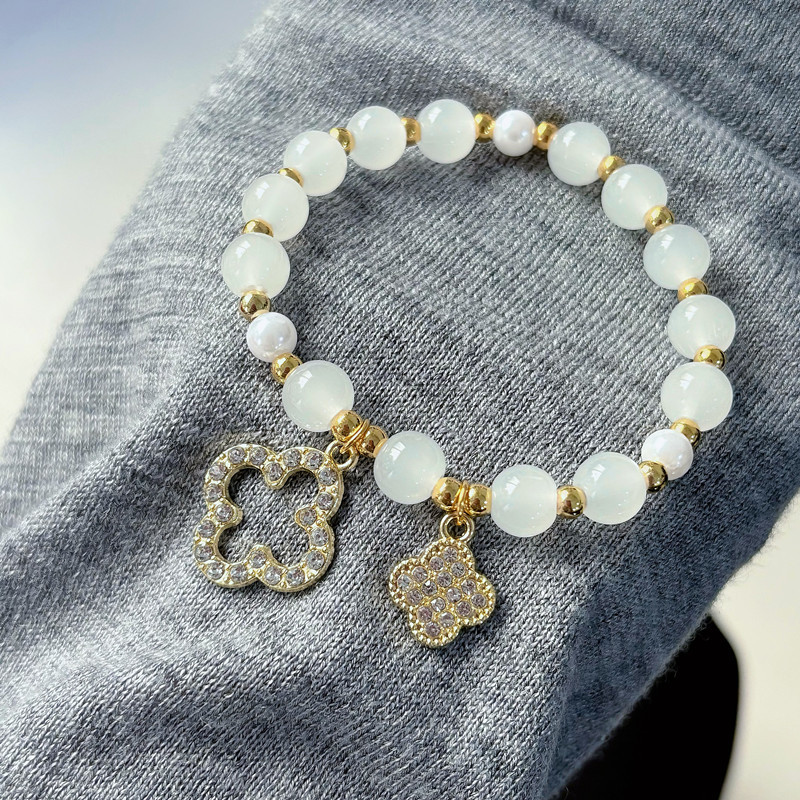 2025 nuevo ojo de gato piedra de cuatro hojas pulsera de vidrio pulsera de perlas de nicho