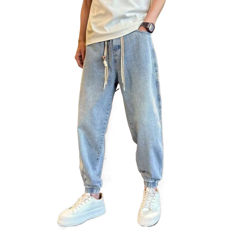 Jean de jogging à taille élastique pour homme, coupe ample et tendance, style harem, idéal pour le printemps et l'automne. Pantalon fuselé polyvalent et décontracté._voghion.com