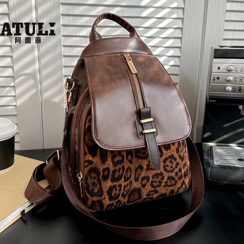 2025 primavera nuevo comercio exterior retro mochila casual impresión de tendencia de contraste de color moda al aire libre versátil gran capacidad