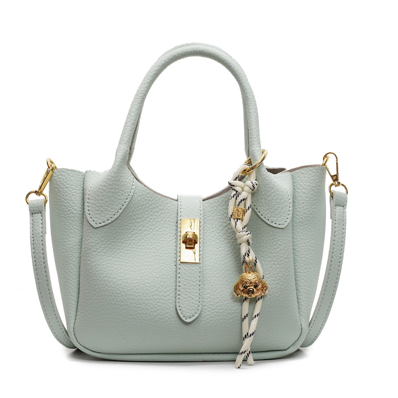 Bolso de cesta de verduras simple de comercio exterior para mujer 2025 nuevo bolso de hombro casual salvaje de moda bolso de cubo de aire extranjero