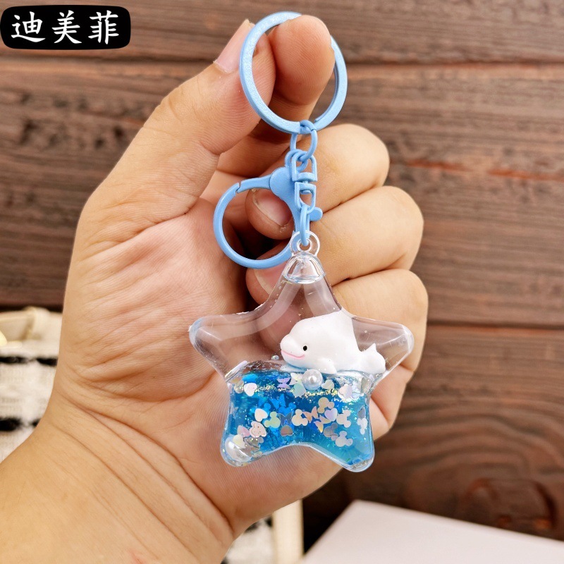 Ballena azul y blanca océano de cinco estrellas con hebilla de color