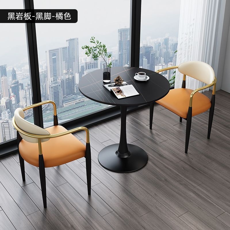 Black legs + black rock slab + orange leather, one table and two chairs