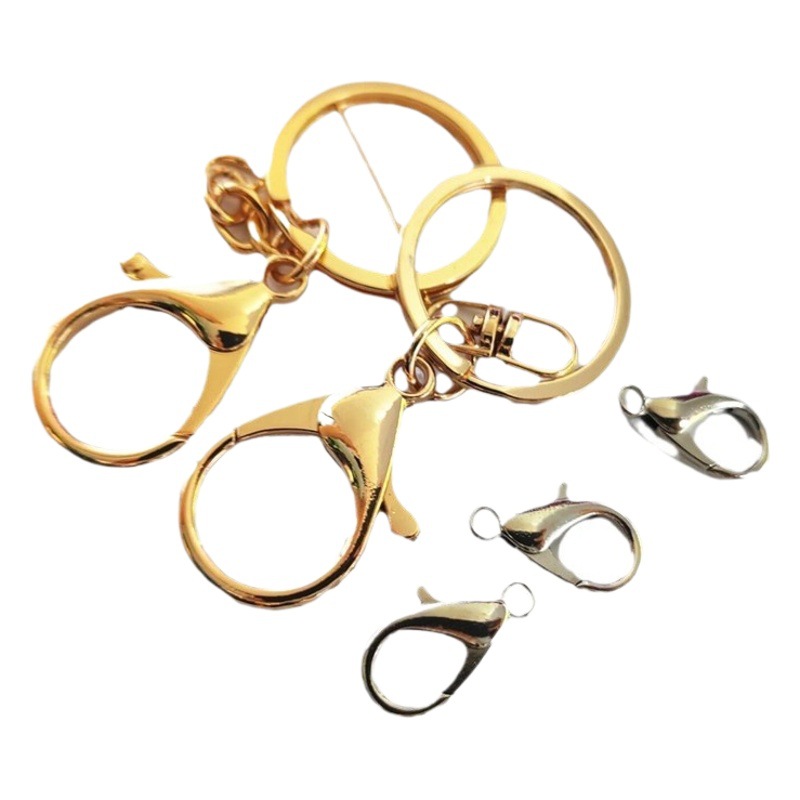 Hebilla de langosta al por mayor bolsa de tres piezas con accesorios de equipaje hebilla de langosta de aleación de zinc llavero hebilla de pulsera de bricolaje